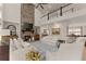 Inviting living room with a brick fireplace and vaulted ceiling, perfect for gatherings at 6635 Canyon Cv, Cumming, GA 30028