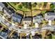 An aerial view showcases a property within a well-laid-out neighborhood setting at 2195 Well Springs Dr, Buford, GA 30519