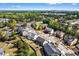 An aerial view displays a neighborhood's layout, showcasing residential homes at 2195 Well Springs Dr, Buford, GA 30519