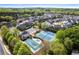 Aerial shot showing neighborhood clubhouse, pool, and tennis courts at 2195 Well Springs Dr, Buford, GA 30519