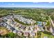 Panoramic aerial view of a residential community featuring well-maintained homes and lush green landscaping at 2195 Well Springs Dr, Buford, GA 30519