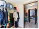 Spacious walk-in closet with clothing racks and view of the bedroom through the doorway at 2195 Well Springs Dr, Buford, GA 30519