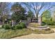 Attractive community sign for Meranova at Mill Creek surrounded by manicured landscaping at 2195 Well Springs Dr, Buford, GA 30519