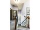 Upstairs hallway with a view of the laundry room and bedrooms, offering easy access to all living spaces at 2195 Well Springs Dr, Buford, GA 30519