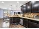 Well-equipped kitchen with granite countertops, stainless steel appliances, and ample cabinet space for storage at 2195 Well Springs Dr, Buford, GA 30519