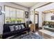 Cozy sitting area with comfortable seating, natural light, and access to a well-appointed dining room at 2195 Well Springs Dr, Buford, GA 30519