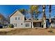 Exterior view of the home's backyard, with well-maintained lawn, patio, and siding at 3245 Country Walk Dr, Powder Springs, GA 30127