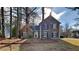 Charming two-story home featuring a combination brick and siding exterior and well-maintained landscaping at 3245 Country Walk Dr, Powder Springs, GA 30127