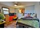 Cozy bedroom features hardwood-style floors and ample natural light at 3526 Highway 11 S, Mansfield, GA 30055