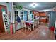 Eat-in kitchen offers a beautiful table, with ample storage and stainless steel appliances at 3526 Highway 11 S, Mansfield, GA 30055