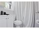 Clean bathroom with white fixtures, modern accents, and a bright window at 514 English Nw Ave, Atlanta, GA 30318
