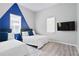 Inviting bedroom with two twin beds, stylish decor, and a television at 514 English Nw Ave, Atlanta, GA 30318