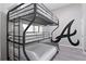Cozy bedroom with triple bunk beds, modern decor, and an 'A' wall design at 514 English Nw Ave, Atlanta, GA 30318