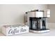 The kitchen's coffee bar has a Keurig machine and a selection of coffee pods at 514 English Nw Ave, Atlanta, GA 30318