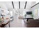 Spacious living area with modern accents, open to the kitchen with stainless steel appliances at 514 English Nw Ave, Atlanta, GA 30318