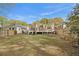 The large backyard features an expansive lawn, deck, and privacy fence at 650 Somerset Ne Ter, Atlanta, GA 30306