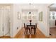 Eat-in dining area with modern pendant lighting and hardwood floors at 650 Somerset Ne Ter, Atlanta, GA 30306