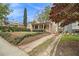 Well-maintained home features a brick driveway, landscaped yard, and inviting front porch at 650 Somerset Ne Ter, Atlanta, GA 30306