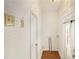 Hallway featuring light wood paneling and hardwood flooring at 650 Somerset Ne Ter, Atlanta, GA 30306