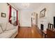Living room with neutral paint, hardwood flooring, and fireplace at 650 Somerset Ne Ter, Atlanta, GA 30306