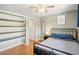 This bedroom has hardwood floors, great natural light, and closet with built-in shelving at 1355 Euclid Ne Ave # B24, Atlanta, GA 30307
