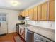 Efficient kitchen with stainless steel appliances, ample counter space, and a convenient in-unit washer/dryer at 1355 Euclid Ne Ave # B24, Atlanta, GA 30307