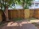 Fenced backyard featuring a wood fence and a brick patio at 136 Peachtree Memorial Nw Dr # Ga8, Atlanta, GA 30309