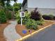 Landscaped walkway, lending library, and bench at 136 Peachtree Memorial Nw Dr # Ga8, Atlanta, GA 30309