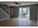 Inviting living room with neutral paint, tile floors, and bright bay window at 136 Peachtree Memorial Nw Dr # Ga8, Atlanta, GA 30309