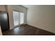 Dining area with wooden floors and sliding doors at 36 S Auburn Landing Pl, Auburn, GA 30011
