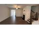 A bright living room with hardwood floors and a fireplace at 36 S Auburn Landing Pl, Auburn, GA 30011