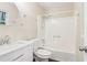 Bathroom with a white vanity, toilet and bath with shower at 746 Polk Nw St, Marietta, GA 30064