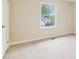 Bright bedroom featuring neutral walls and a view from the window at 746 Polk Nw St, Marietta, GA 30064
