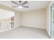Neutral bedroom featuring a ceiling fan and access to an outdoor area at 746 Polk Nw St, Marietta, GA 30064