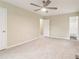 Large bedroom featuring a ceiling fan and access to the bathroom at 746 Polk Nw St, Marietta, GA 30064
