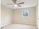 Neutral bedroom with a window and a ceiling fan at 746 Polk Nw St, Marietta, GA 30064