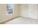 This light-filled bedroom has neutral carpet and paint and a double door closet at 746 Polk Nw St, Marietta, GA 30064