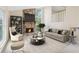 Bright living room with stone fireplace, neutral decor, and large windows offering an inviting atmosphere at 746 Polk Nw St, Marietta, GA 30064