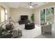 Cozy living room with contemporary furnishings, including a sofa, table, television and access to an outdoor space at 746 Polk Nw St, Marietta, GA 30064