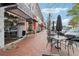 Inviting outdoor seating area outside local business with black tables, perfect for enjoying a meal in the downtown area at 746 Polk Nw St, Marietta, GA 30064