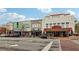 Street view showcasing various shops and restaurants in a quaint downtown area, complete with street parking and sidewalks at 746 Polk Nw St, Marietta, GA 30064