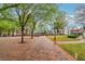 Town square showcasing tree-lined walkways and inviting green spaces at 746 Polk Nw St, Marietta, GA 30064
