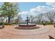Charming town square featuring a beautiful tiered fountain and inviting benches at 746 Polk Nw St, Marietta, GA 30064