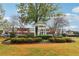 Charming town square featuring a gazebo surrounded by lush greenery and vibrant flowers in a well-maintained garden at 746 Polk Nw St, Marietta, GA 30064