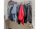 Walk-in closet featuring hanging clothes and a wire shelf above the closet rod at 9061 Jim Purcell Dr, Covington, GA 30014