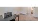 The carpeted home office features an entry and view of an adjacent powder room at 9061 Jim Purcell Dr, Covington, GA 30014