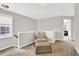 Cozy loft area with a chair and view into other rooms at 1080 Treymont Ln, Lawrenceville, GA 30045