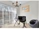 Bright office space with large window, modern desk setup, and comfortable seating at 1080 Treymont Ln, Lawrenceville, GA 30045