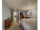 Finished basement bedroom with wood-look flooring and access to additional rooms at 458 Valley Woods Se Cir, Conyers, GA 30094