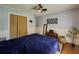Bedroom with hardwood floors, neutral paint scheme, and natural lighting at 458 Valley Woods Se Cir, Conyers, GA 30094